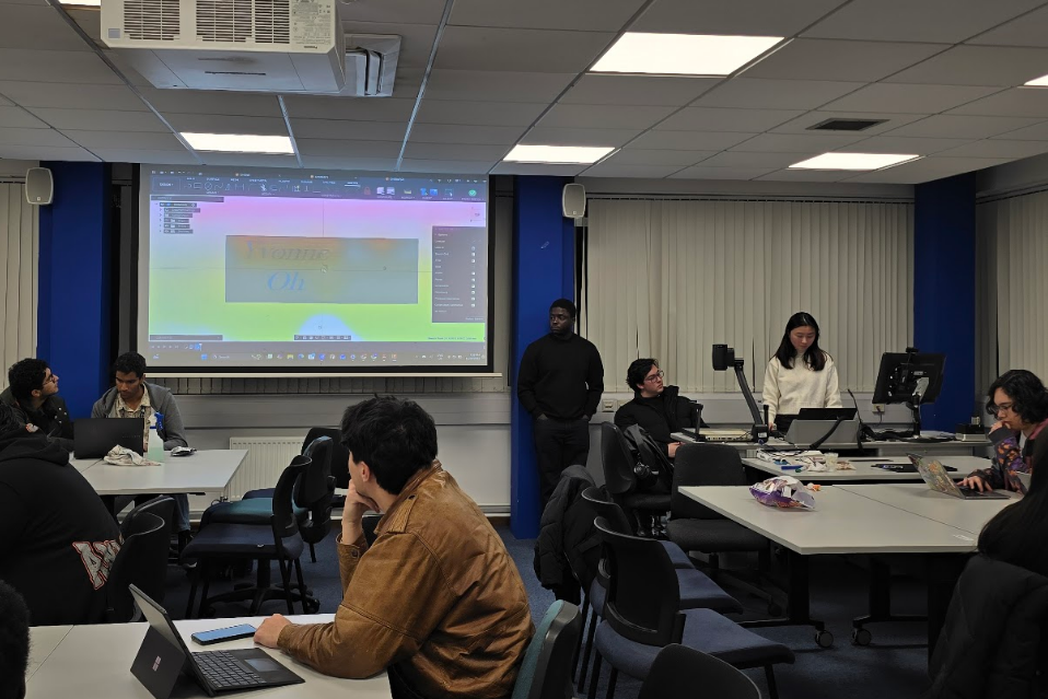 RoboSoc members working together during a technical session