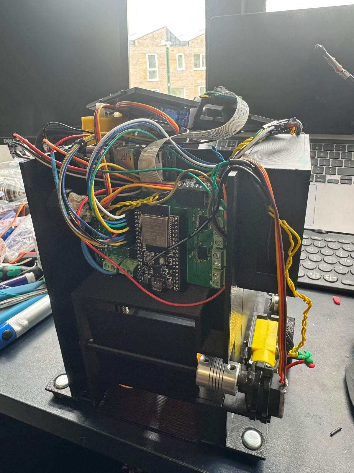 Rear view of RoboSoc's UniBots robot showing its electronics and wiring